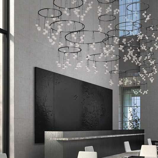 Suspenders Vertical Ring Matrix with Glass Cluster Luminaires by SONNEMAN