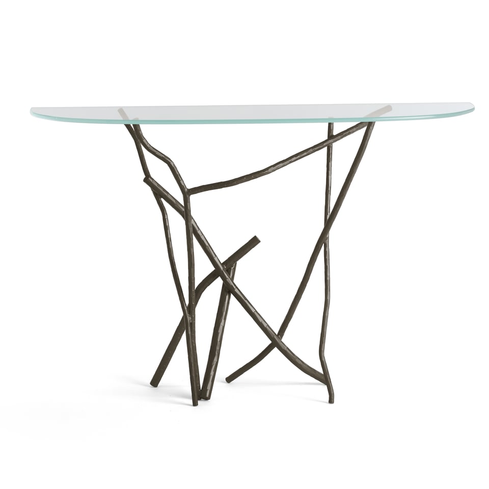 Hubbardton Forge tables featuring artisan craftsmanship and refined finishes for versatile use.