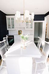 Dillon 9-Light Chandelier by Hudson Valley Lighting with Adjustable Height and Aged Brass Finish