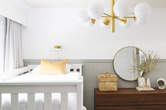 Mitzi Stella 8-Light Chandelier with Opal Glass Shades in Aged Brass and Old Bronze Finish