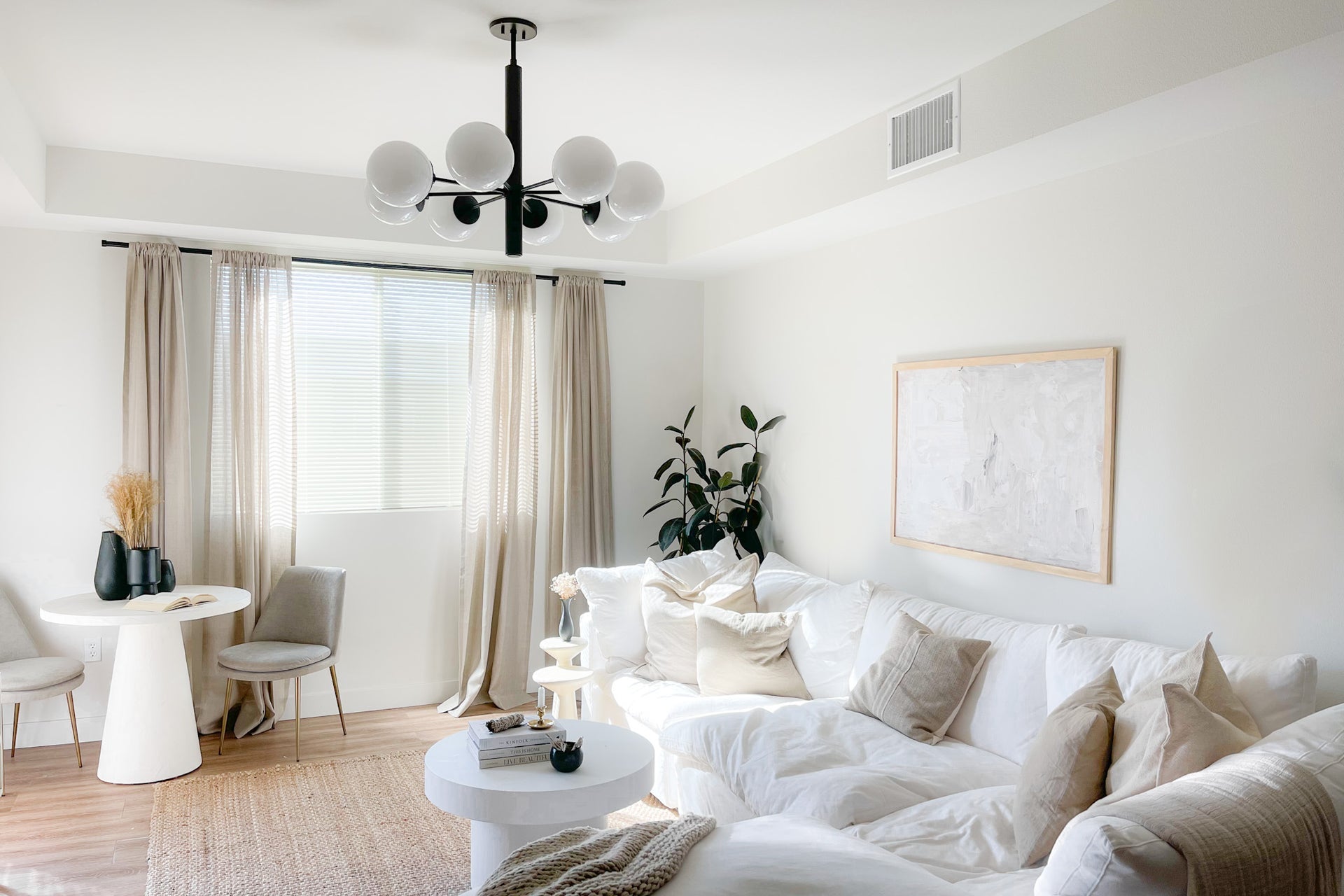 Mitzi Stella 8-Light Chandelier with Opal Glass Shades in Aged Brass and Old Bronze Finish