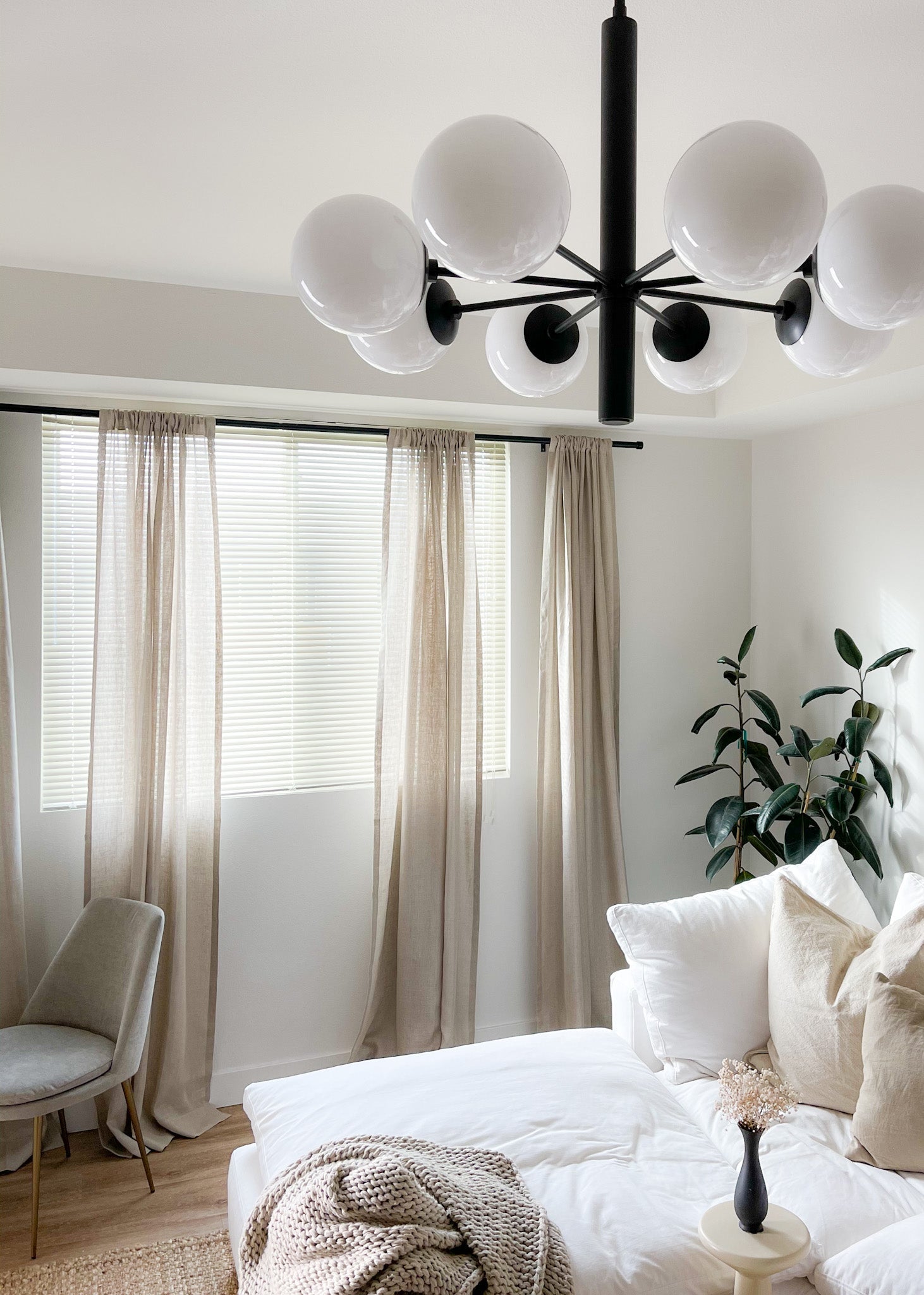 Mitzi Stella 8-Light Chandelier with Opal Glass Shades in Aged Brass and Old Bronze Finish