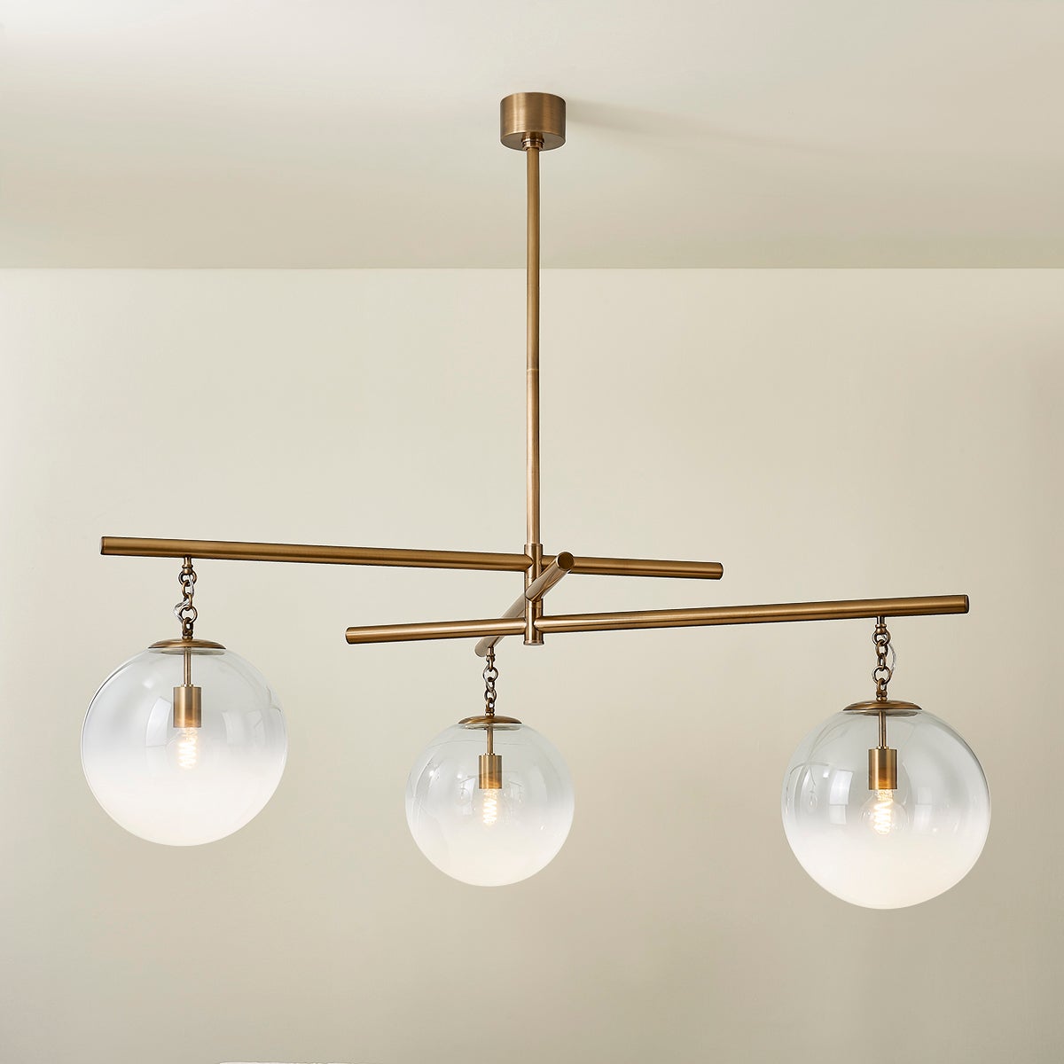Wade Large Chandelier by Troy Lighting - 31" to 70.75" Adjustable Height, Dimmable, Patina Brass Finish