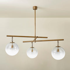Wade Large Chandelier by Troy Lighting - 31" to 70.75" Adjustable Height, Dimmable, Patina Brass Finish
