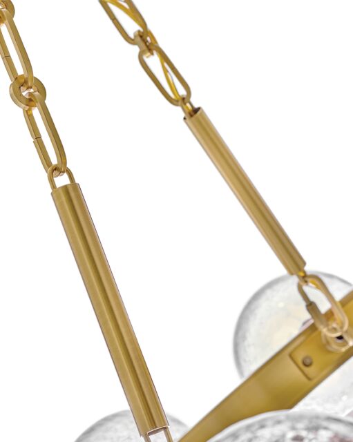 Coco Medium 12-Light Chandelier by Fredrick Ramond in Lacquered Brass with Crackle Glass Shades
